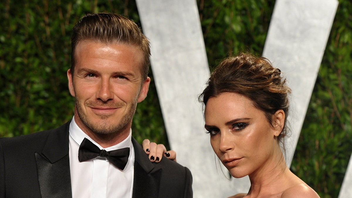 Victoria and David Beckham at an event