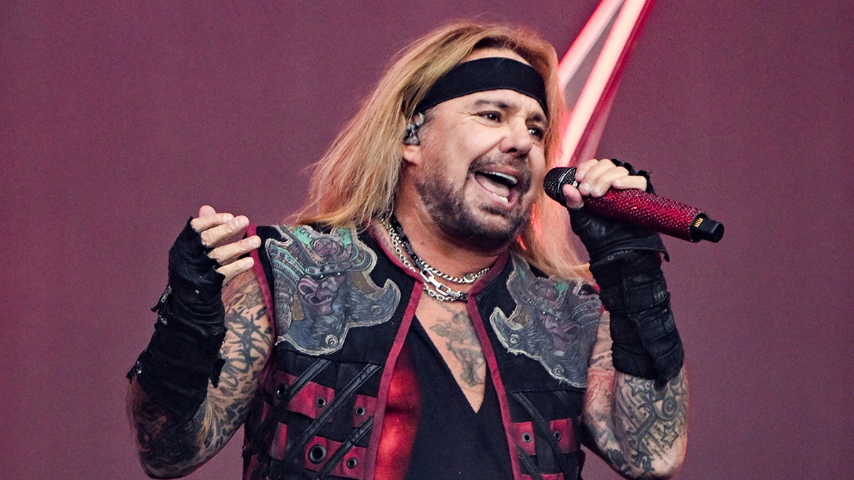 Vince Neil of Motley Crue performs on stage at concert