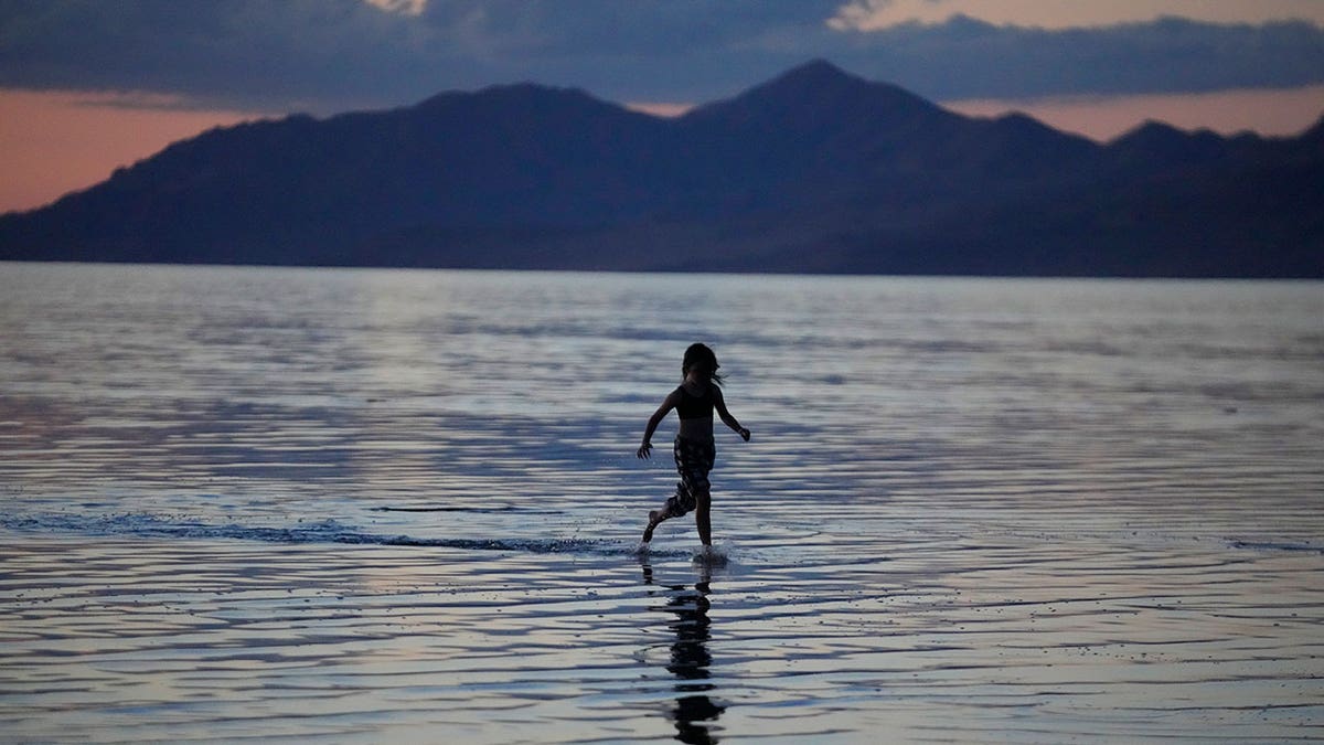 person runs through Great Salt Lake