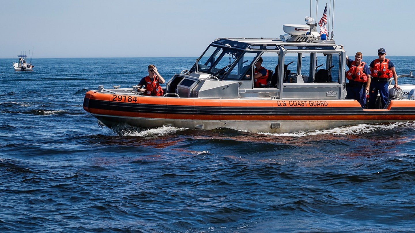 Rescuers Resume Search for Two Swimmers Missing in Lake Michigan