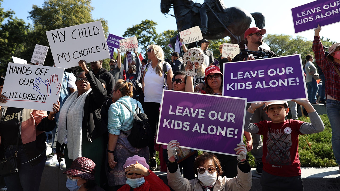 leave our kids alone protest signs canada