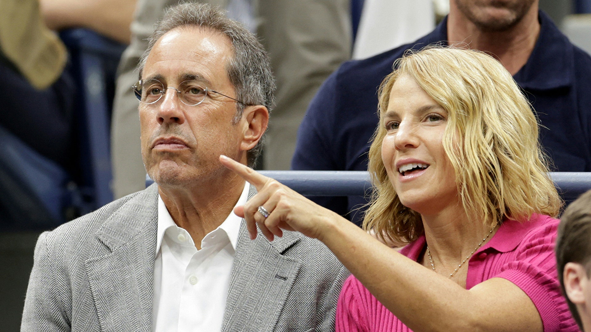 Jerry Seinfeld sports a grey blazer with wife Jessica Seinfeld at US Open
