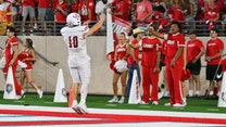 New Mexico State quarterback's lewd action on rival team's logo caught on camera
