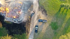 Bodycam captures dramatic shoot-out with man accused of slaughtering family before he vanishes