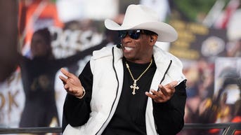 Deion Sanders paralyzed with fear after unexpected guest visits his office