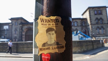 Terror suspect who clung to van in daring prison escape likely had 'inside' help: report