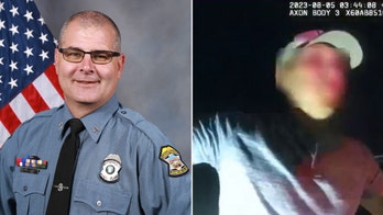 Video shows Kansas deputy hug distressed motorist during traffic stop