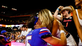 Florida's Graham Mertz shares smooch with Miss Wisconsin girlfriend after massive win over Tennessee