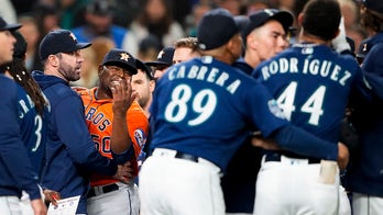 Astros' Hector Neris stomps toward and yells at Mariners' Julio Rodriguez after strikeout