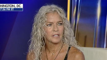 Oberlin College coach berated for stance on trans athletes in women's sports says she never broke school rules