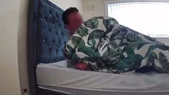 Woman unnerved when security footage reveals stranger in her bed: 'I was shocked'