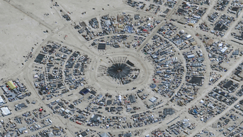Death at Burning Man festival investigated as flooding strands thousands in Nevada desert