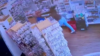 Woman returns to store she allegedly shoplifted to demand phone she left behind