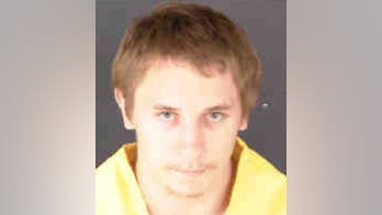 Adopted Ukrainian son, 22, charged with murdering Florida parents, leading police on hourslong manhunt