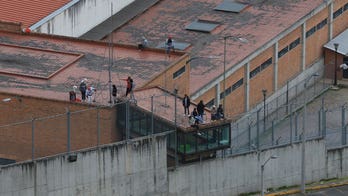 57 guards, officers released in Ecuador following hostage takeover in several prisons, authorities say