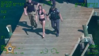 Florida mother leaves son in car to go swimming and 'meet sharks,' police say