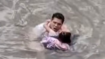 Man jumps into fast-flowing river to rescue little girl: See the heroic moment