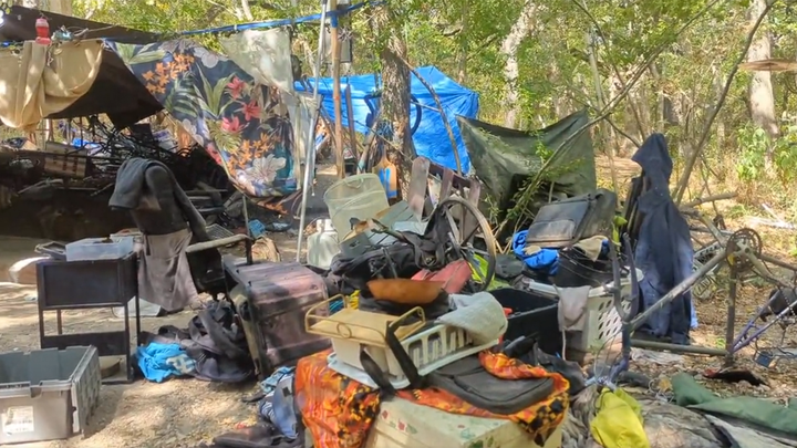 Blue city's prized parkland 'destroyed' by huge homeless camp, trash strewn 'as far as the eye can see'