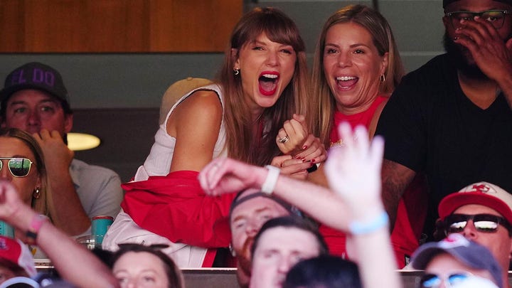 Taylor Swift cheers on the Chiefs, helps clean up suite