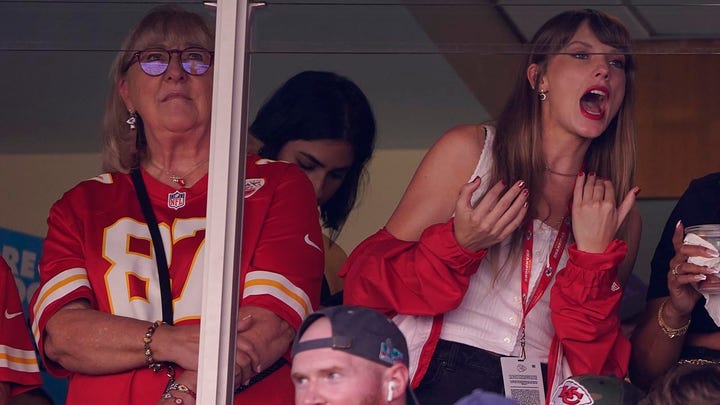 Taylor Swift cheers on the Chiefs, helps clean up suite