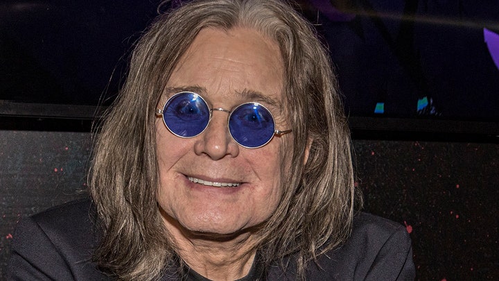 Ozzy Osbourne on ‘road to recovery’ as he leaves hospital in a wheelchair with wife Sharon following ‘major operation’