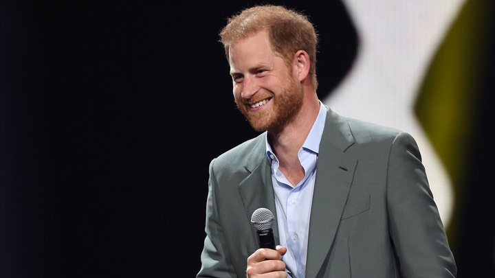 Prince Harry surprises fan at Heart of Invictus screening