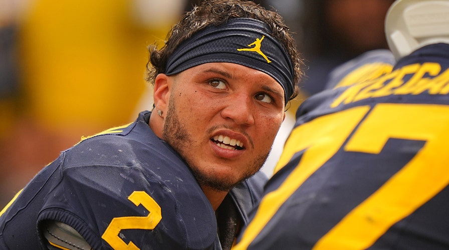 Michigan s Blake Corum making an impact off the field realizes