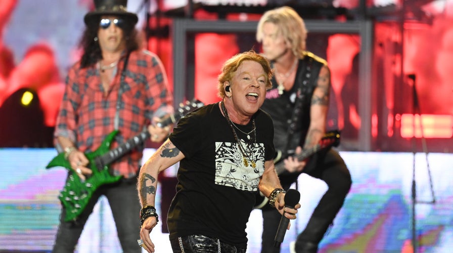 Guns N Roses cuts show short due to Axl Roses illness
