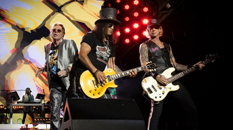 Guns N Roses cuts show short due to Axl Roses illness