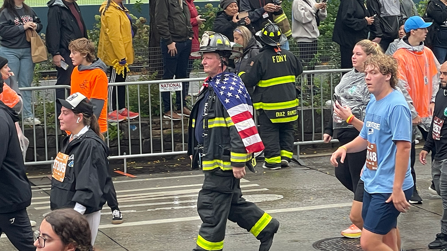 firefighter with flag