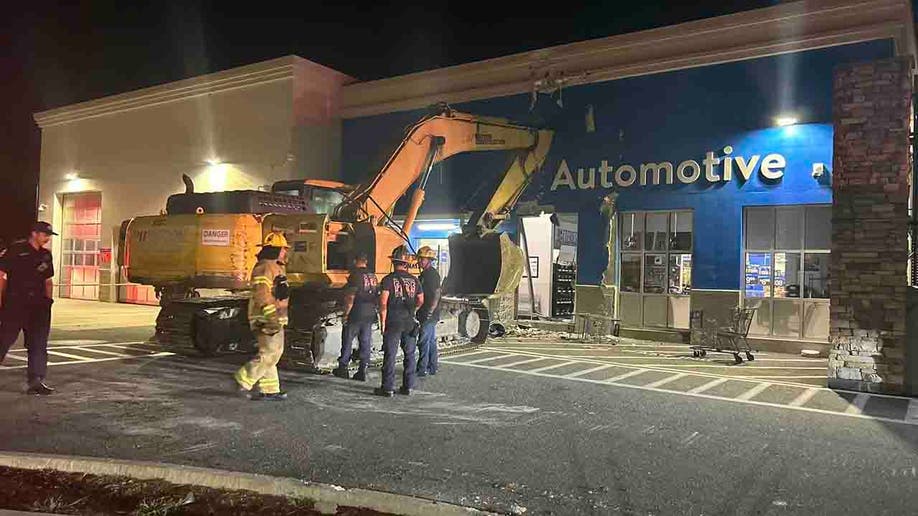 excavator crashed into Walmart