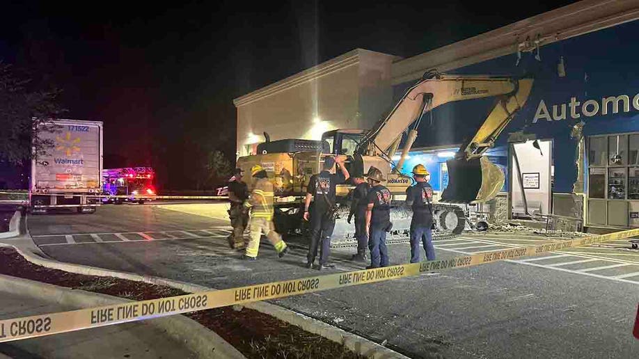 excavator crashed into Walmart