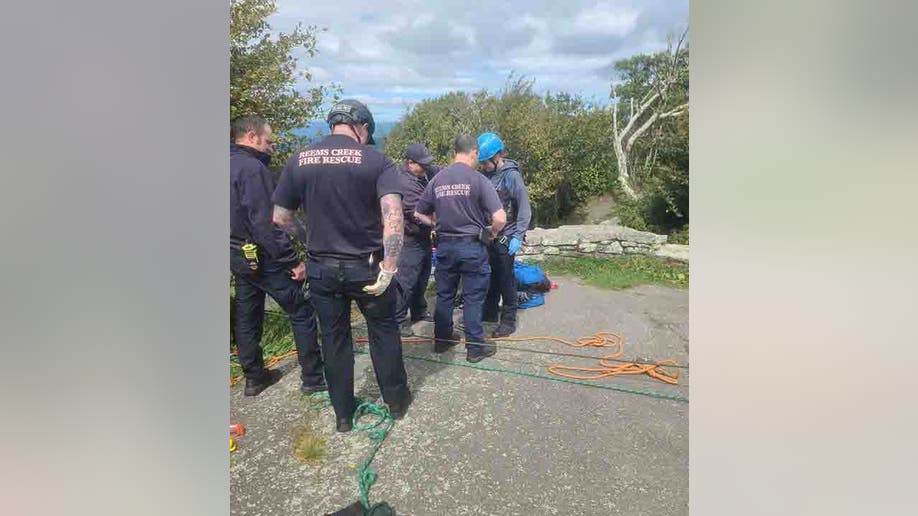 fire officials getting ready to rappel