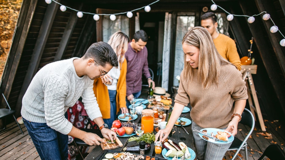 Younger generations hosting at-home dinner parties on a budget: ‘Save money, have a potluck’