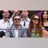 Jon Hamm sports grey suit with wife Jenny Osceola in green dress at US Open tennis match