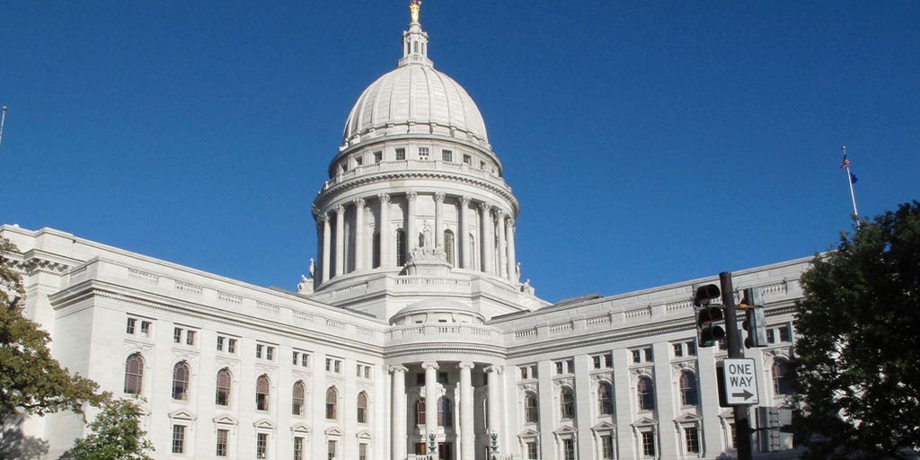 Man who brought guns to Wisconsin Capitol twice faces misdemeanor charge - Vimarsana News