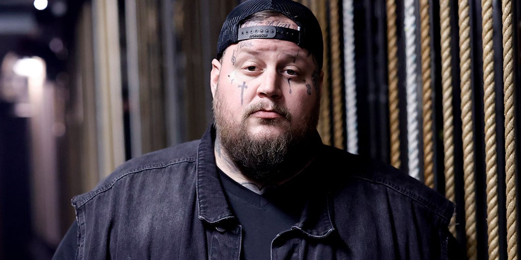 Jelly Roll embraces role in country music revolution after overcoming addiction and prison time - Vimarsana News