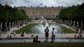 FILE - Visitors enjoy the Chateau de Versailles gardens, outside Paris, France, on July 15, 2023. The Louvre Museum in Paris and Versailles Palace evacuated visitors and staff Saturday, Oct. 14, 2023 after receiving bomb threats. The government has put France on high security alert after a fatal school stabbing by a suspected extremist.