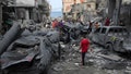 Palestinians inspect the rubble of the West mosque destroyed after it was hit by an Israeli airstrike at Shati refugee camp in Gaza City on Monday, Oct. 9, 2023.