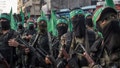 Palestinian Hamas terrorists are seen during a military show in the Bani Suheila district on July 20, 2017 in Gaza City, Gaza.