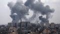 Smoke rises following Israeli strikes in Gaza on Tuesday.