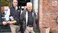 Michael Arnold is escorted out of the Saratoga Town Court in Schuylerville, New York on Tuesday, October 10, 2023. Arnold is accused of flying his single-engine plane over Cassie Wilusz&rsquo;s home and posting threatening messages online.
