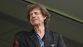 LONDON, ENGLAND - JULY 28: The Rolling Stones lead singer Mick Jagger smiles as he watches the cricket during day two of the LV= Insurance Ashes 5th Test Match between England and Australia at The Kia Oval on July 28, 2023 in London, England. (Photo by Stu Forster/Getty Images)