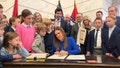 Republican Arkansas Gov. Sarah Sanders signs an education overhaul bill into law, Little Rock, Arkansas, Wednesday, March 8, 2023.