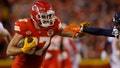 Travis Kelce #87 of the Kansas City Chiefs carries the ball against the Denver Broncos during the second quarter at GEHA Field at Arrowhead Stadium on October 12, 2023 in Kansas City, Missouri.