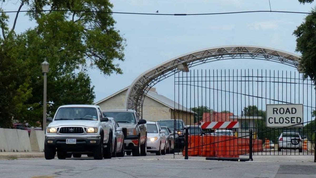 vehicles leaving Fort Sam Houston gate