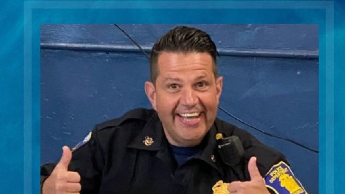 yonkers Detective Sergeant Frank Gualdino smiling and posing for a picture