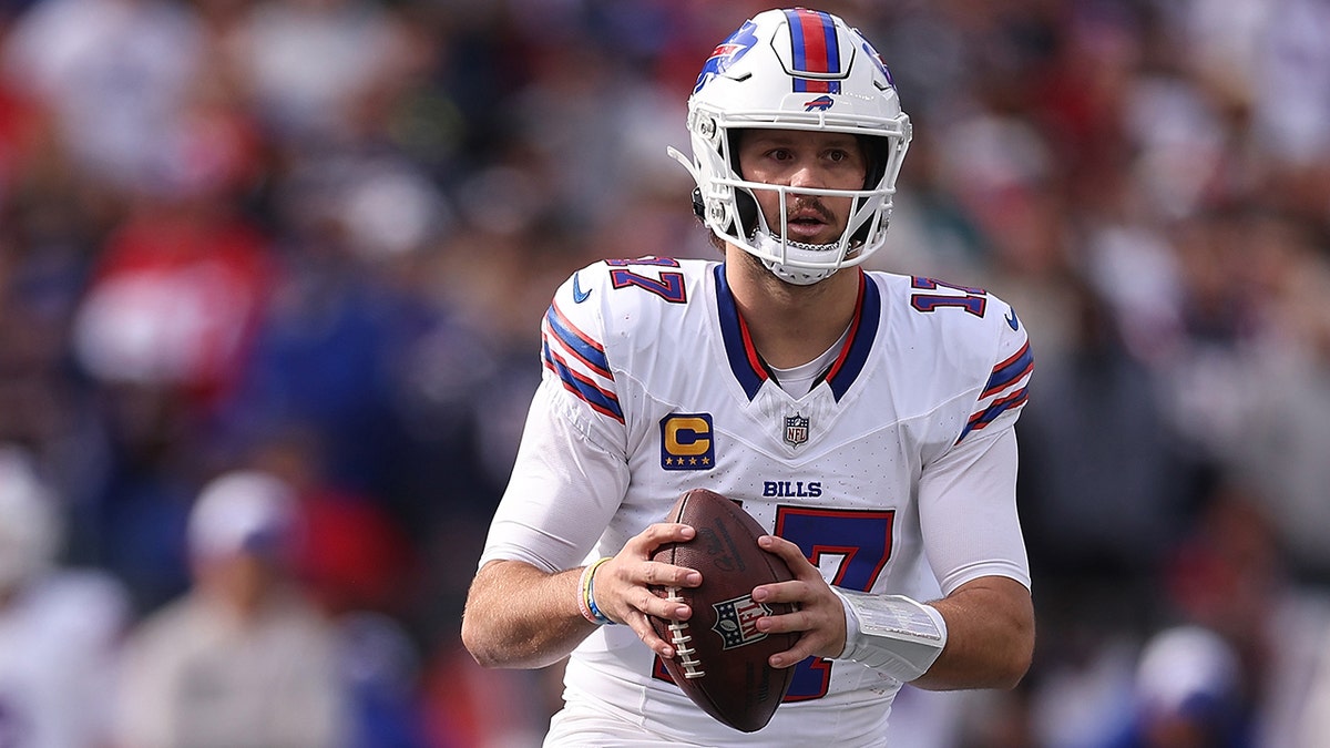 Josh Allen drops back