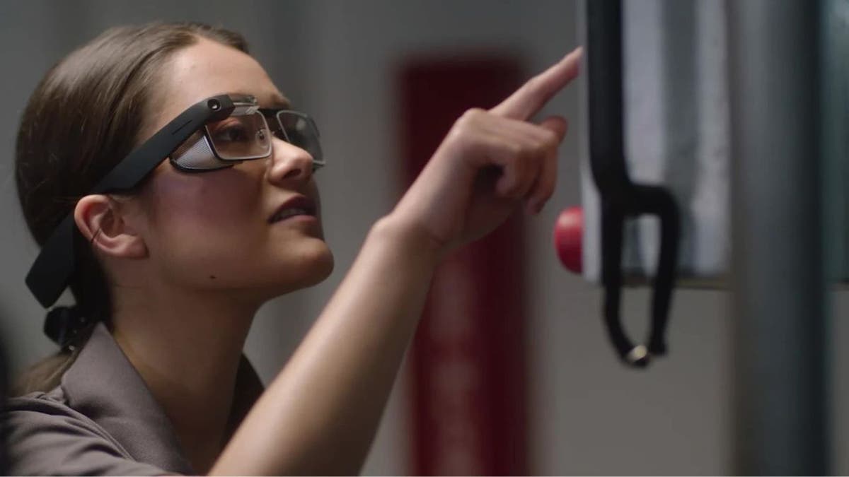 Woman using Google Glass.