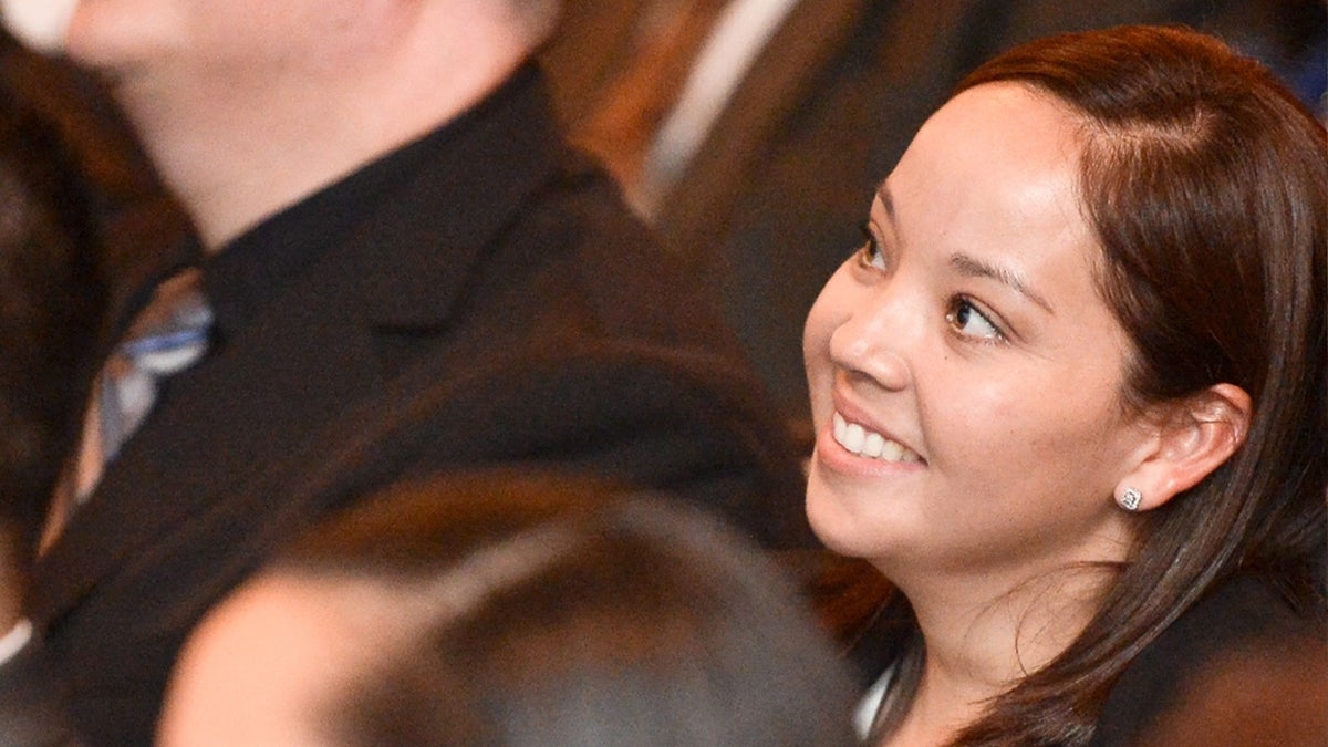 Texas Army National Guard Staff Sgt. Denise Rosales looks upward